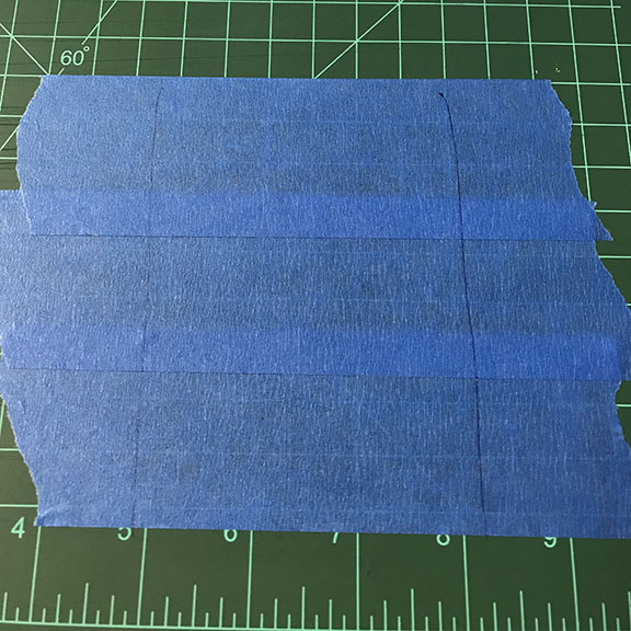 Shape of mason jar drawn on painters tape
