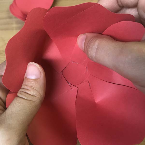 Completing first layer of paper flower