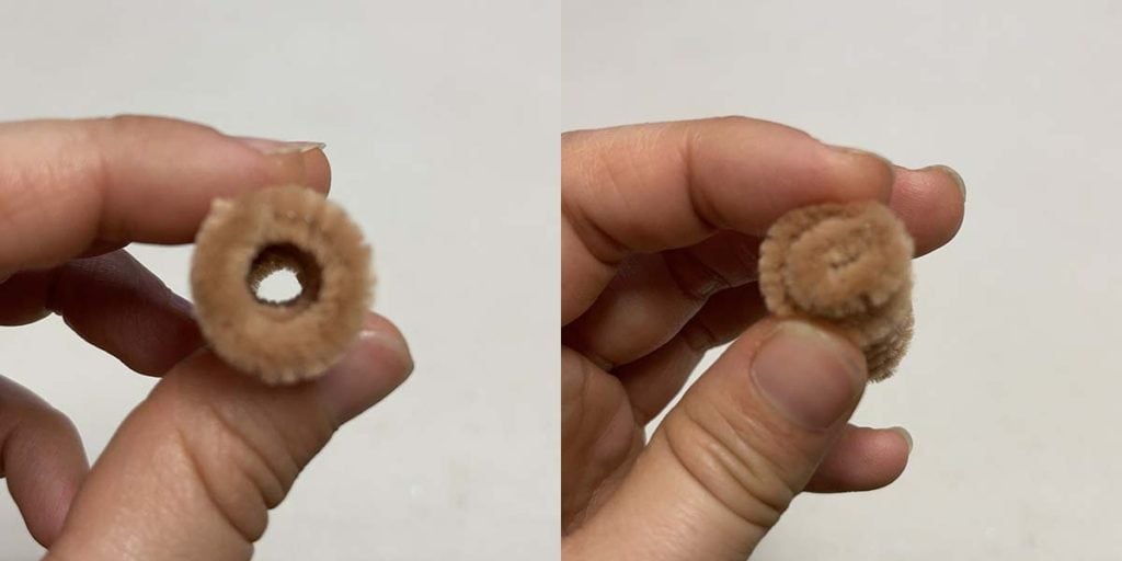 Bending end of pipe cleaner to cover opening where pen was