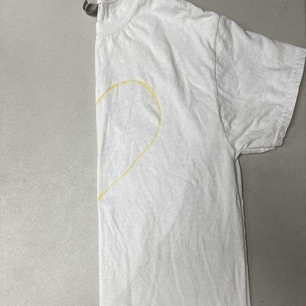 Half heart drawn on shirt