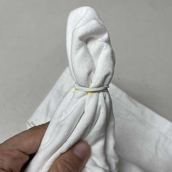 Securing line of heart with rubber band