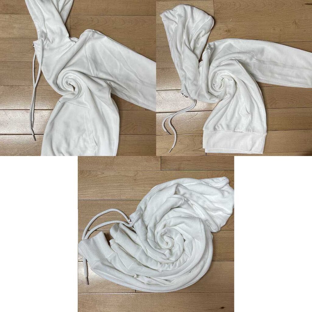 Twisting hoodie into spiral for spider tie dye pattern