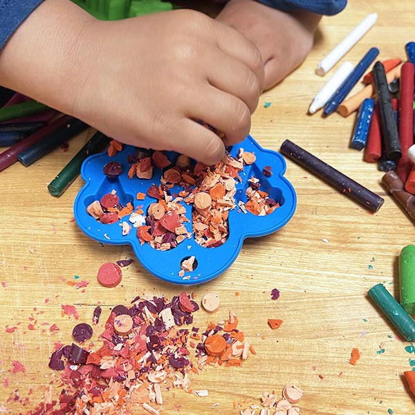 Adding crayon pieces to mold