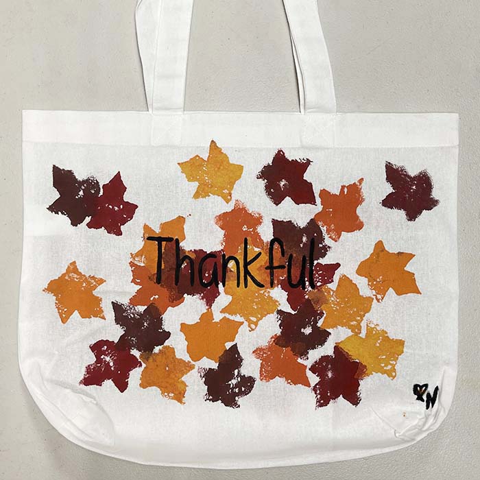Painted in letters on Thankful bag