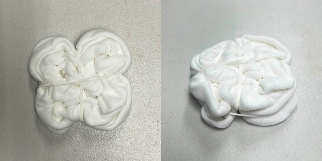 securing baby beanie hat with rubber bands