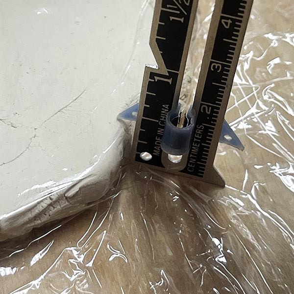 Measuring thickness of clay