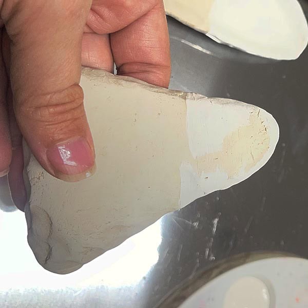 Painting the backs of the dishes white