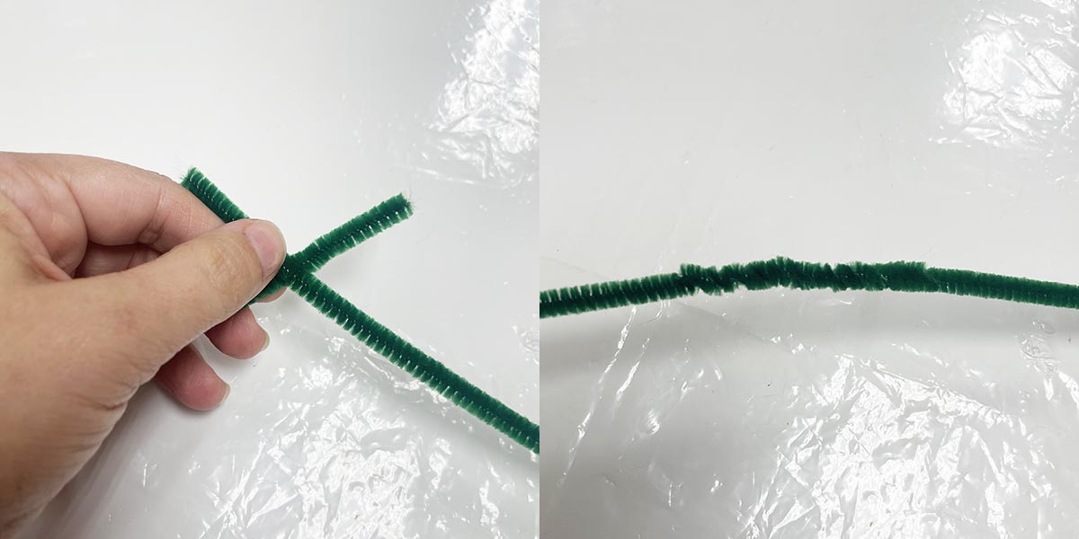 Twisting green pipe cleaners together