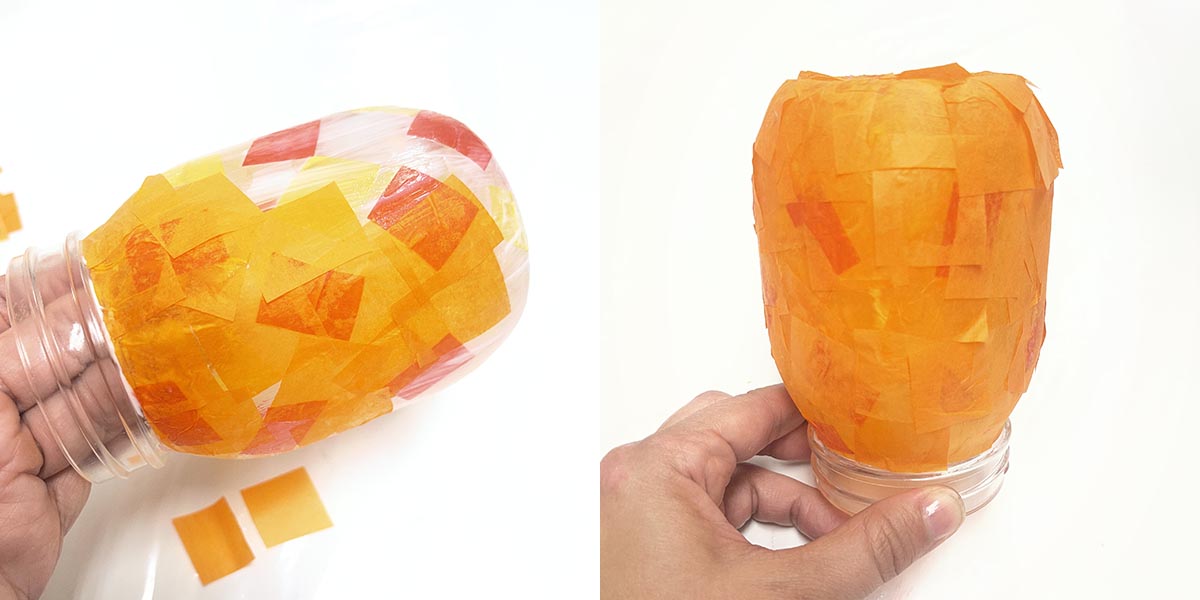 Covering mason jar with orange tissue paper